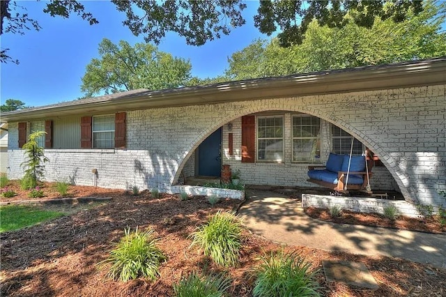 1013 Mary Lee Ln, Edmond, OK 73034 - view of front of house featuring brick siding