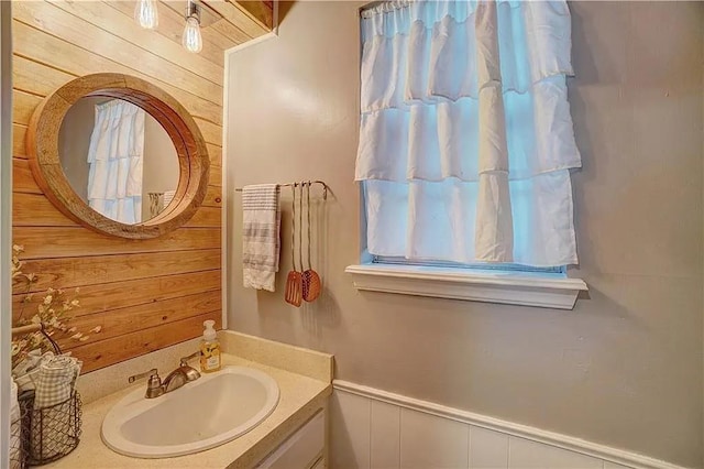 1013 Mary Lee Ln, Edmond, OK 73034 - bathroom with wood walls and vanity