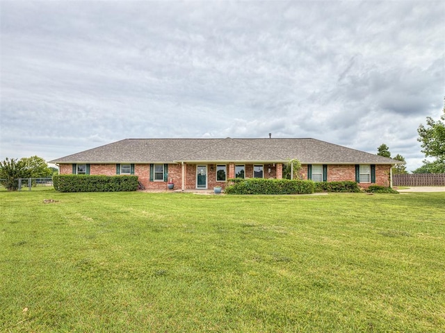 975 Garden Rd, Tuttle, OK 73089 - ranch-style home with brick siding
