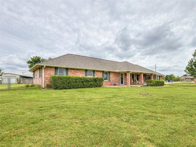 975 Garden Rd, Tuttle, OK 73089 - single story home featuring brick siding