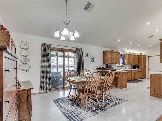975 Garden Rd, Tuttle, OK 73089 - dining room featuring a chandelier, recessed lighting, and lofted ceiling