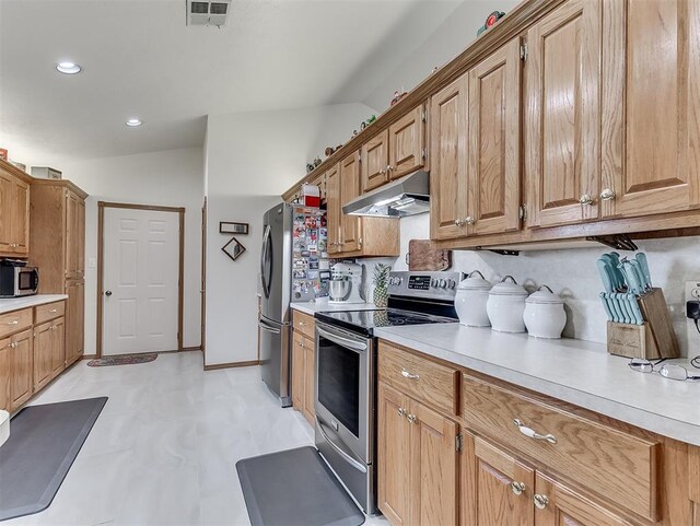 975 Garden Rd, Tuttle, OK 73089 - kitchen featuring stainless steel appliances, under cabinet range hood, light countertops, recessed lighting, and brown cabinets