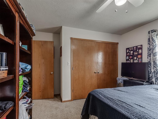 975 Garden Rd, Tuttle, OK 73089 - carpeted bedroom featuring a closet and ceiling fan