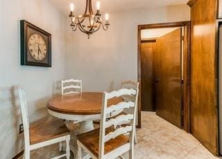801 Belle Air Ave, Edmond, OK 73013 - dining space featuring a chandelier