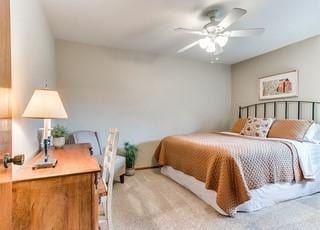 801 Belle Air Ave, Edmond, OK 73013 - bedroom featuring light colored carpet