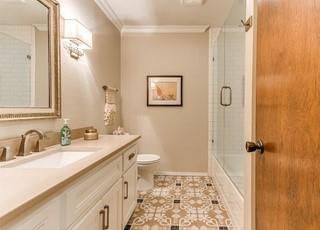 801 Belle Air Ave, Edmond, OK 73013 - full bath featuring vanity, crown molding, and tile patterned floors