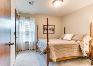 801 Belle Air Ave, Edmond, OK 73013 - view of carpeted bedroom