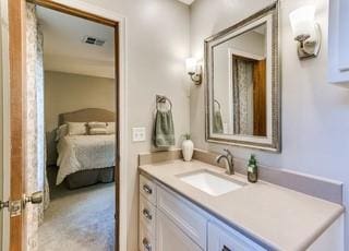 801 Belle Air Ave, Edmond, OK 73013 - ensuite bathroom featuring vanity