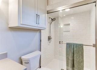 801 Belle Air Ave, Edmond, OK 73013 - bathroom with a stall shower and vanity