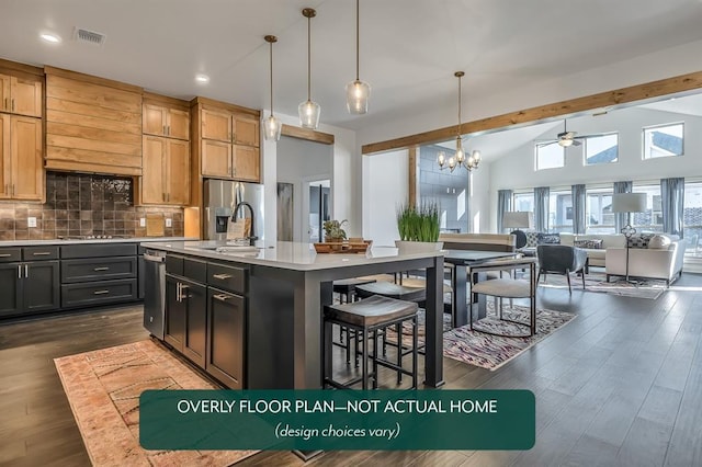 1420 SW 160th St, Moore, OK 73170 - kitchen featuring light countertops, stainless steel fridge, decorative backsplash, open floor plan, and dark wood-type flooring