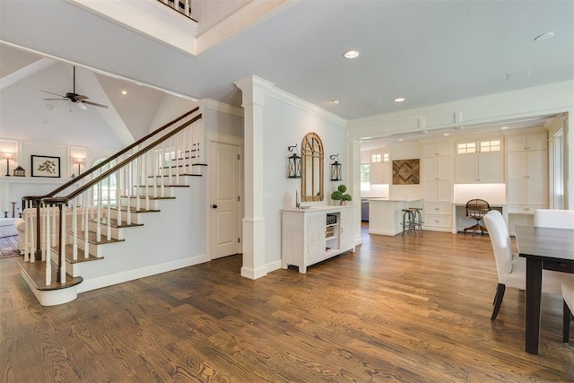 1300 Oak Springs Ln, Edmond, OK 73034 - entrance foyer featuring recessed lighting, stairway, ornamental molding, dark wood-style floors, and a ceiling fan
