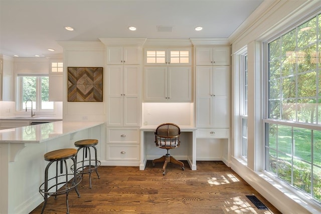 1300 Oak Springs Ln, Edmond, OK 73034 - office featuring crown molding, dark wood-style floors, and recessed lighting