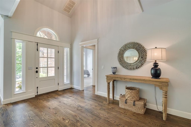1300 Oak Springs Ln, Edmond, OK 73034 - entryway featuring wood finished floors and high vaulted ceiling