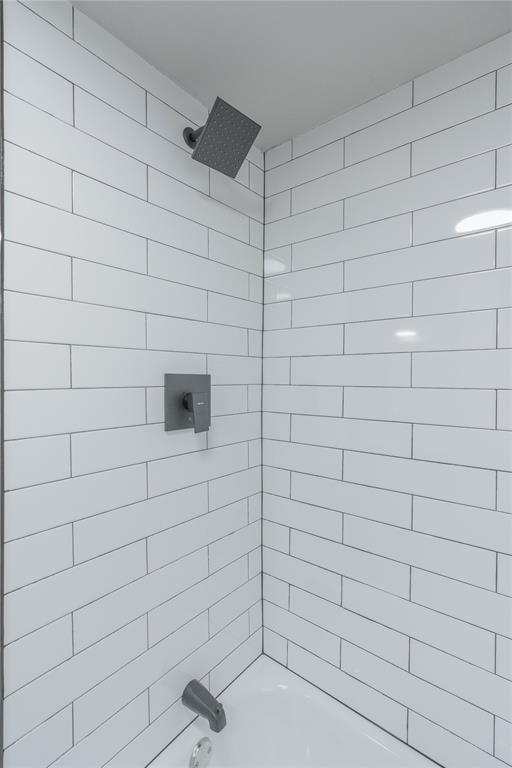bathroom featuring bathtub / shower combination