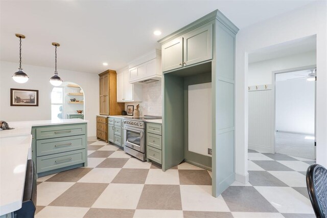 1112 Mary Lee Ln, Edmond, OK 73034 - kitchen with stainless steel range with electric cooktop, light floors, green cabinetry, and decorative light fixtures
