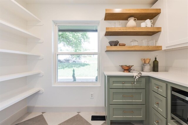 1112 Mary Lee Ln, Edmond, OK 73034 - storage area featuring wine cooler