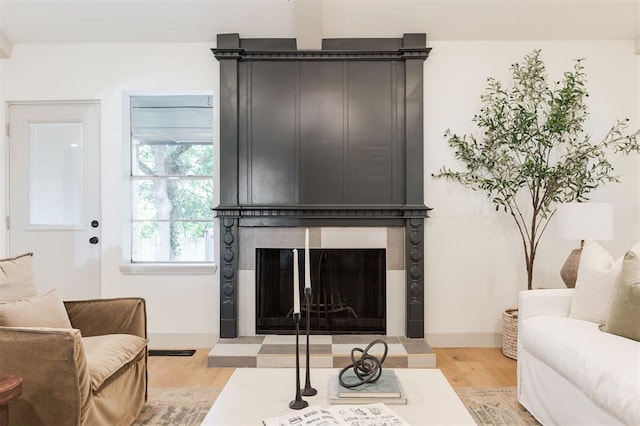 1112 Mary Lee Ln, Edmond, OK 73034 - living area featuring wood finished floors and a large fireplace