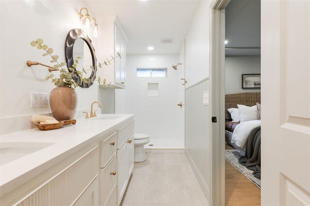 1112 Mary Lee Ln, Edmond, OK 73034 - full bath with a shower stall, double vanity, tile patterned flooring, and ensuite bath