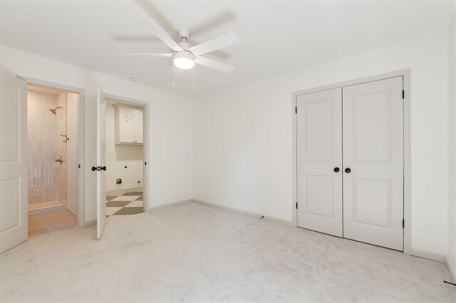 1112 Mary Lee Ln, Edmond, OK 73034 - unfurnished bedroom with light carpet, a closet, ceiling fan, and ensuite bath