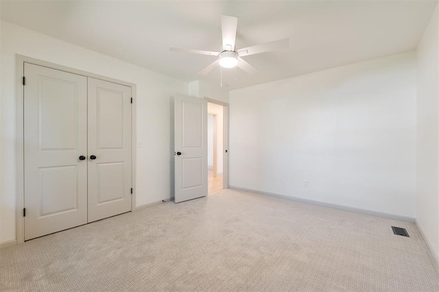 1112 Mary Lee Ln, Edmond, OK 73034 - unfurnished bedroom featuring carpet, a closet, and ceiling fan