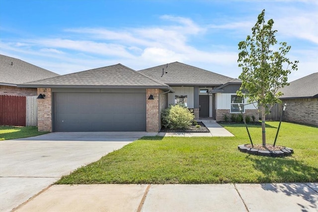 1108 Blackjack Creek Dr, Yukon, OK 73099 - view of front facade with a garage, concrete driveway, roof with shingles, and brick siding