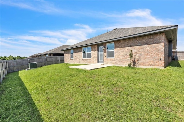 1108 Blackjack Creek Dr, Yukon, OK 73099 - back of property featuring a fenced backyard, a patio, brick siding, and roof with shingles
