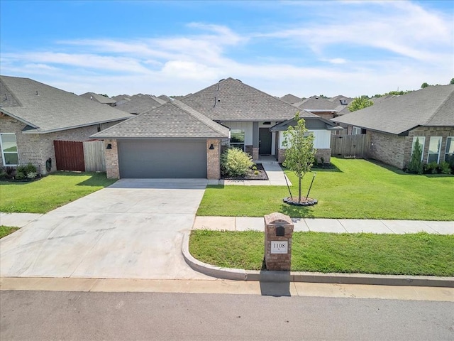 1108 Blackjack Creek Dr, Yukon, OK 73099 - view of front of house featuring a garage, concrete driveway, a residential view, brick siding, and roof with shingles