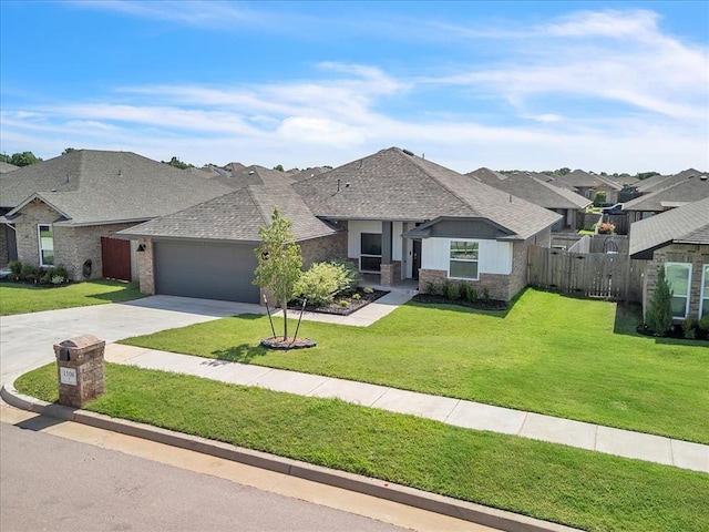 1108 Blackjack Creek Dr, Yukon, OK 73099 - french country inspired facade with driveway, an attached garage, roof with shingles, and brick siding