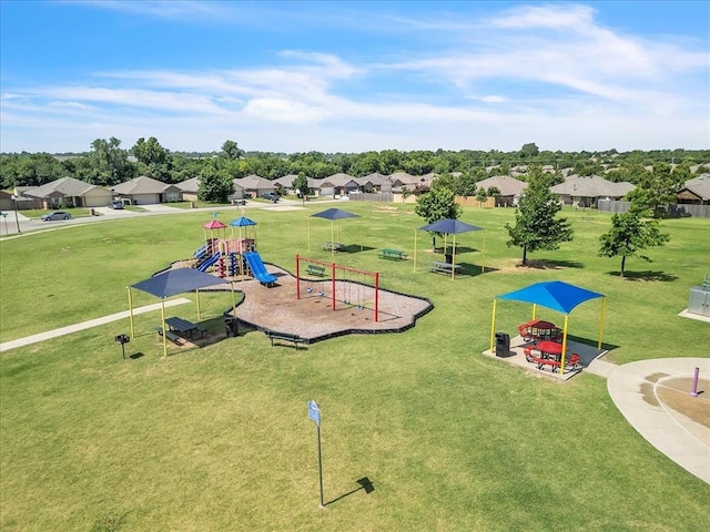 1108 Blackjack Creek Dr, Yukon, OK 73099 - communal playground featuring a lawn and a residential view