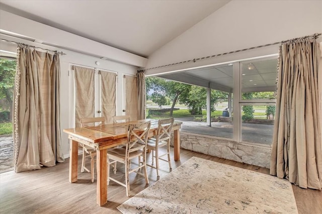 417 Garth Brooks Blvd, Yukon, OK 73099 - dining room with lofted ceiling and wood finished floors