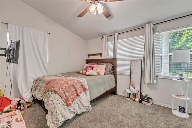 417 Garth Brooks Blvd, Yukon, OK 73099 - bedroom with vaulted ceiling, multiple windows, carpet, and a ceiling fan