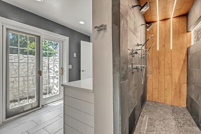 1205 Shalamar Rd, Edmond, OK 73013 - bathroom featuring tiled shower and recessed lighting