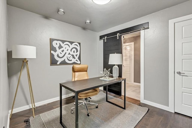 1205 Shalamar Rd, Edmond, OK 73013 - office with a barn door and wood finished floors