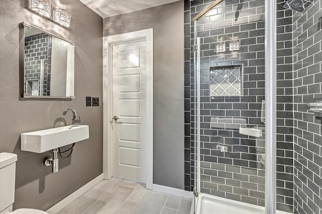 1205 Shalamar Rd, Edmond, OK 73013 - bathroom featuring a sink and a shower stall