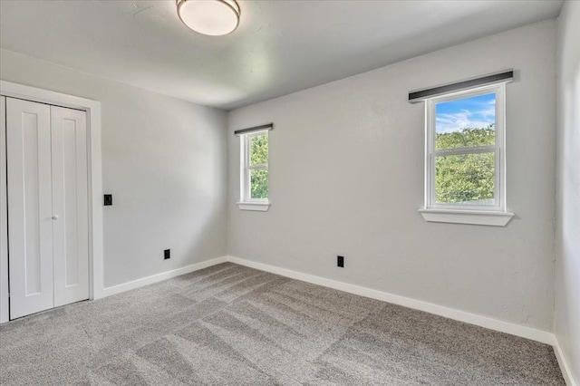 1205 Shalamar Rd, Edmond, OK 73013 - unfurnished bedroom with carpet and a closet