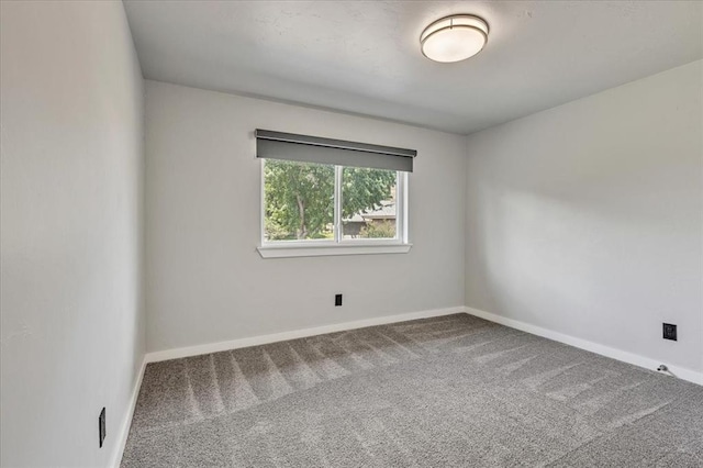 1205 Shalamar Rd, Edmond, OK 73013 - spare room with carpet and baseboards