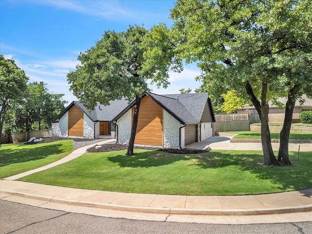 1205 Shalamar Rd, Edmond, OK 73013 - view of front of home featuring stone siding