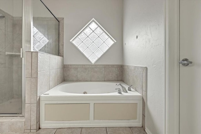 732 Tuscany Way, Edmond, OK 73034 - bathroom with a stall shower, a jetted tub, and tile patterned flooring