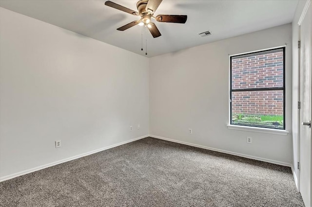 732 Tuscany Way, Edmond, OK 73034 - carpeted spare room with a ceiling fan and baseboards