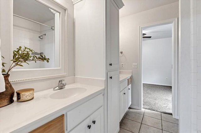 732 Tuscany Way, Edmond, OK 73034 - full bathroom with vanity, tile patterned flooring, and a shower