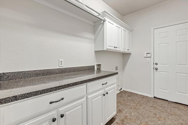 732 Tuscany Way, Edmond, OK 73034 - laundry area featuring cabinet space and hookup for a washing machine