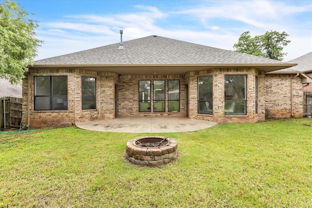 732 Tuscany Way, Edmond, OK 73034 - rear view of property with an outdoor fire pit, a patio, a shingled roof, and brick siding