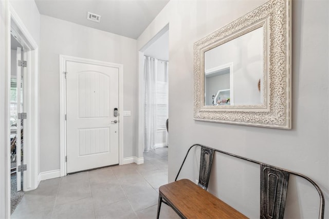 609 NW 180th St, Edmond, OK 73012 - entryway featuring baseboards and light tile patterned floors