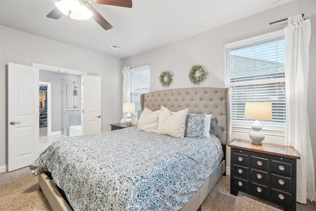 609 NW 180th St, Edmond, OK 73012 - bedroom featuring carpet floors, multiple windows, and ceiling fan