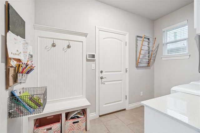 609 NW 180th St, Edmond, OK 73012 - mudroom with light tile patterned floors and baseboards