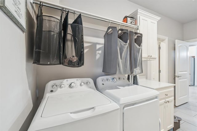 609 NW 180th St, Edmond, OK 73012 - laundry room with independent washer and dryer and cabinet space