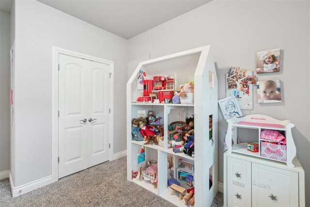 609 NW 180th St, Edmond, OK 73012 - playroom with carpet flooring and baseboards