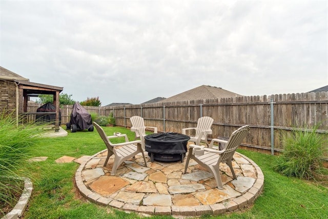609 NW 180th St, Edmond, OK 73012 - fenced backyard featuring an outdoor fire pit