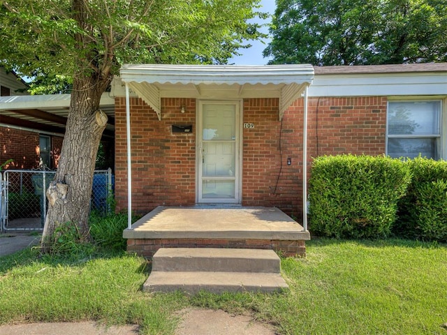 109 E Northrup Dr, Oklahoma City, OK 73110 - view of exterior entry featuring brick siding