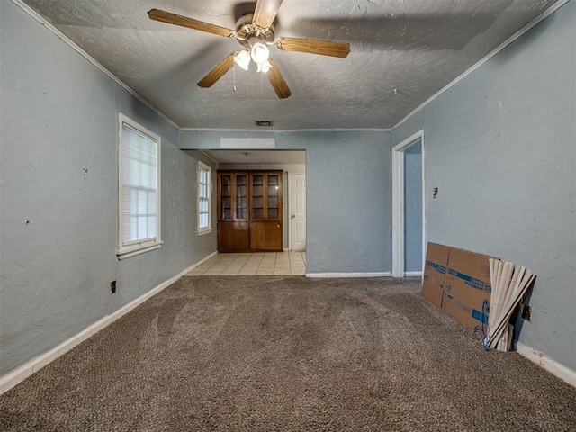 109 E Northrup Dr, Oklahoma City, OK 73110 - carpeted spare room featuring a textured ceiling, ceiling fan, and ornamental molding